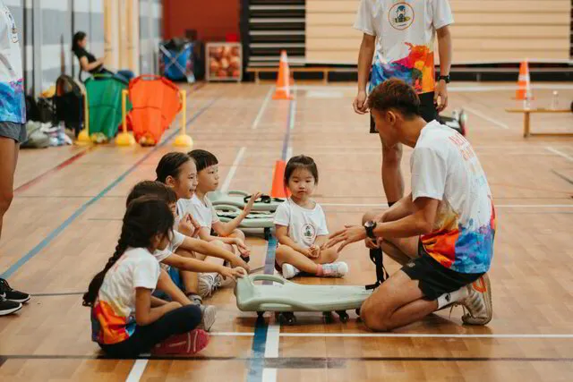 Children participating in sports program at Dreamers Sports Academy Singapore