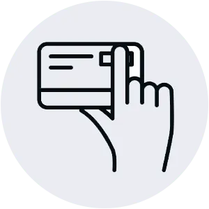 A hand holding a credit card, ready for a transaction.