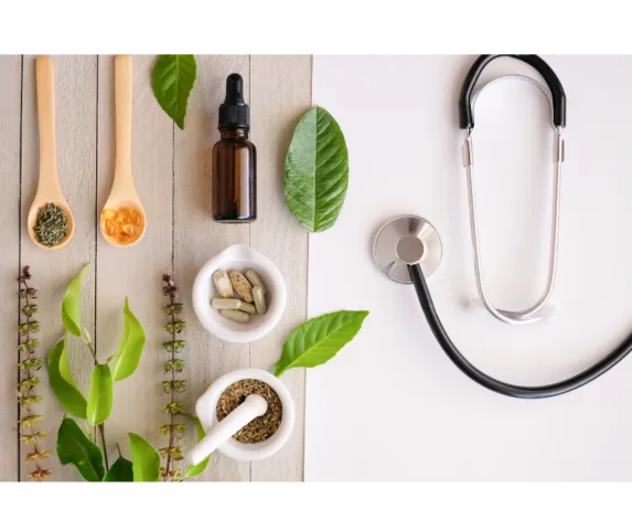 natural medicine and herbs with stethoscope