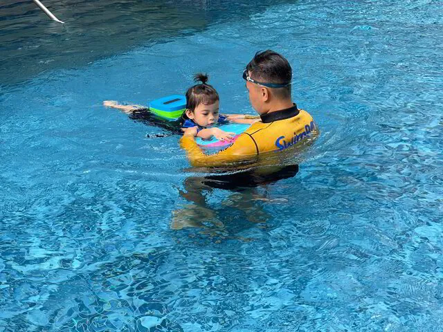 Condo swimming lesson for baby