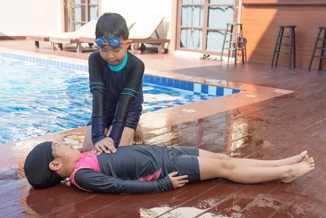 Children Lifesaving in Private Pool - Children Swimming Lessons