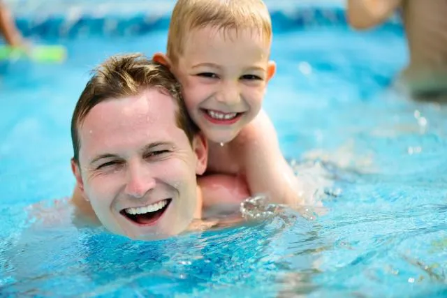 Father with the son in Family Swimming Lessons