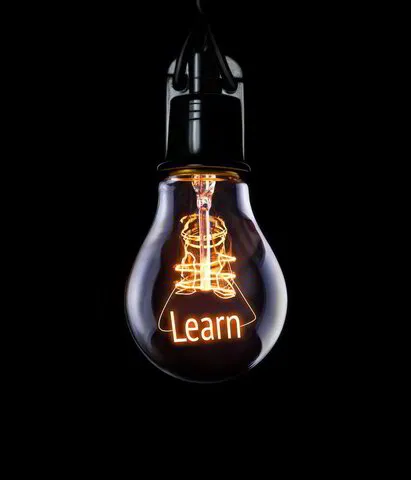 Light bulb with the word Learn lit up