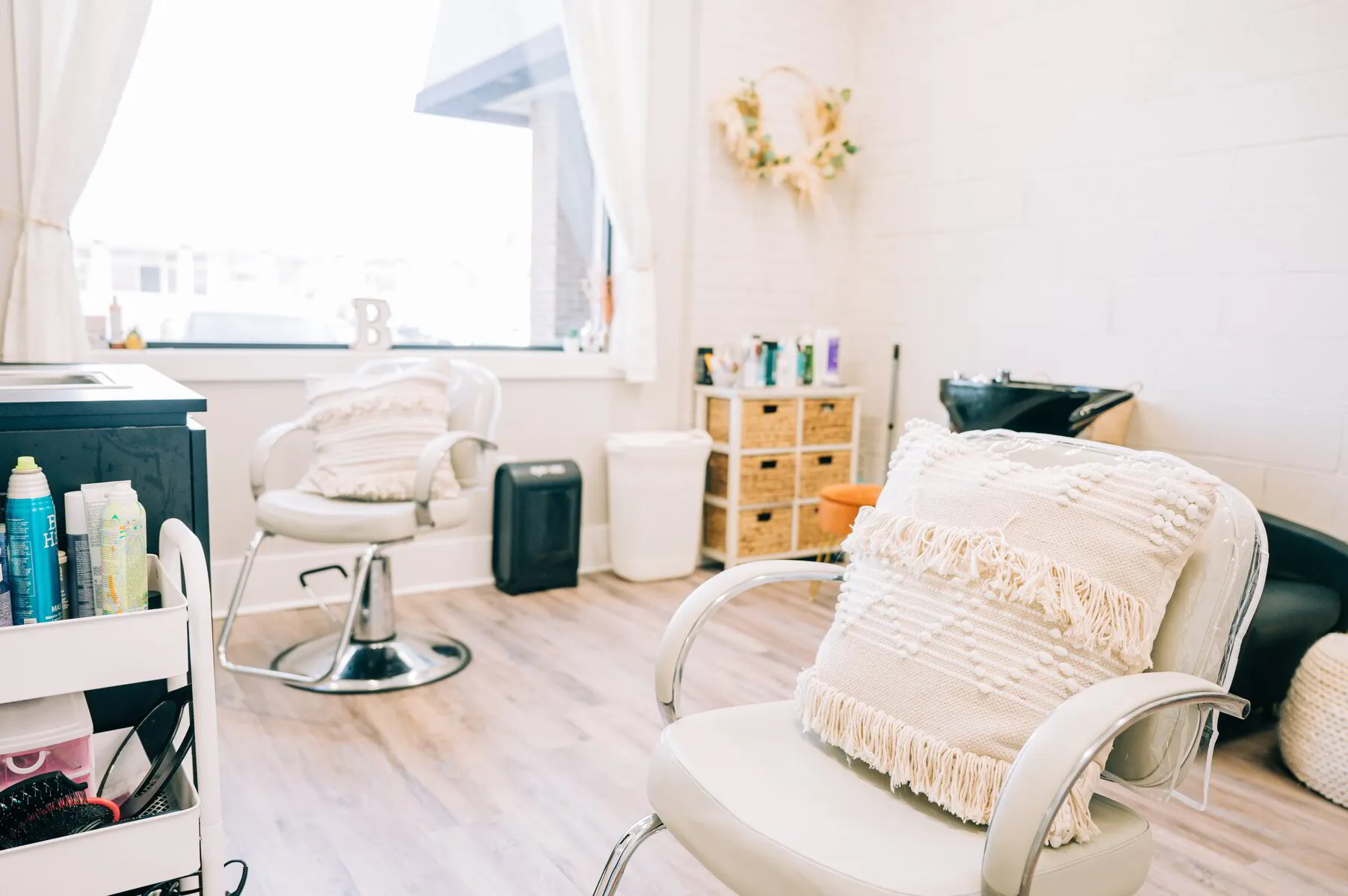 What are the pros and cons of working for a salon or owning your own salon business?