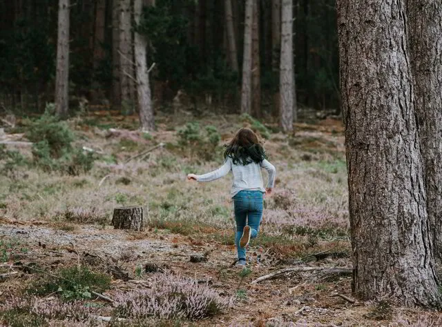Little girl running away 