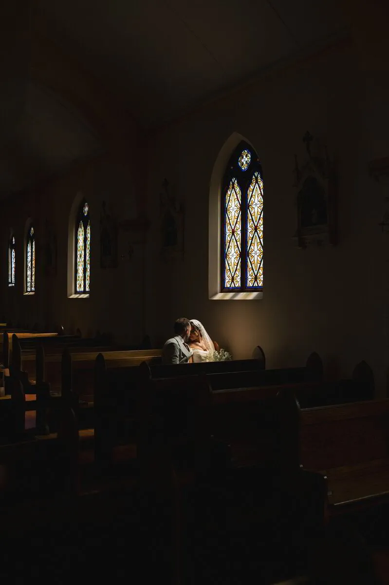Emotional wedding ceremony embrace