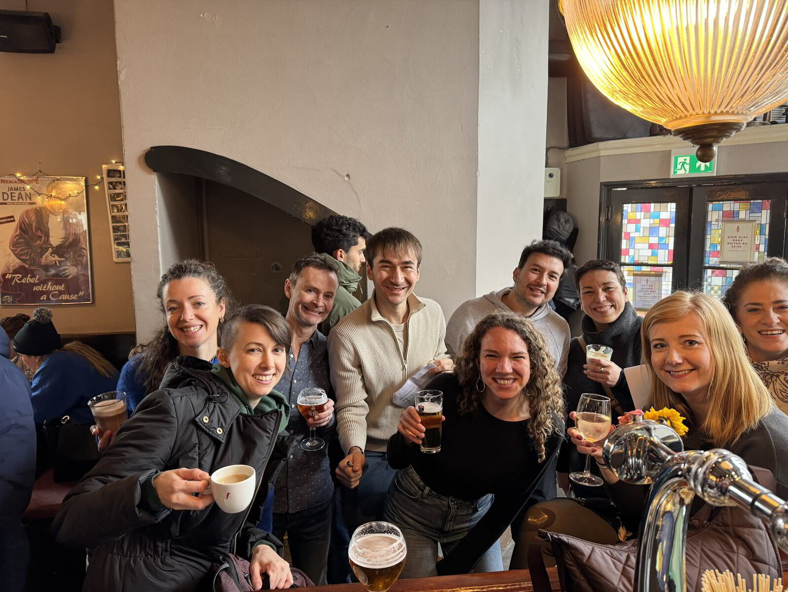 Amstel Dutch students having drinks in a bruin café after a Dutch City Experience