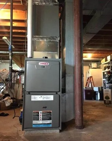 A new furnace installation in a residential mechanical room