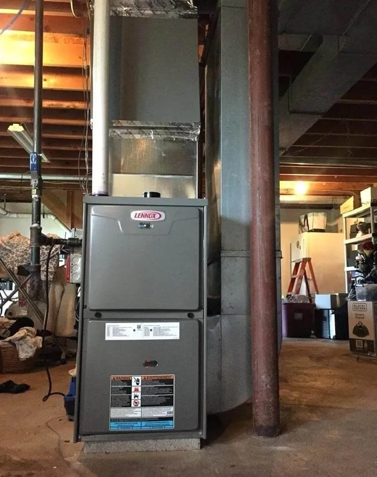 A new furnace installation in a residential mechanical room