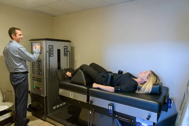 patient using spinal decompression machine
