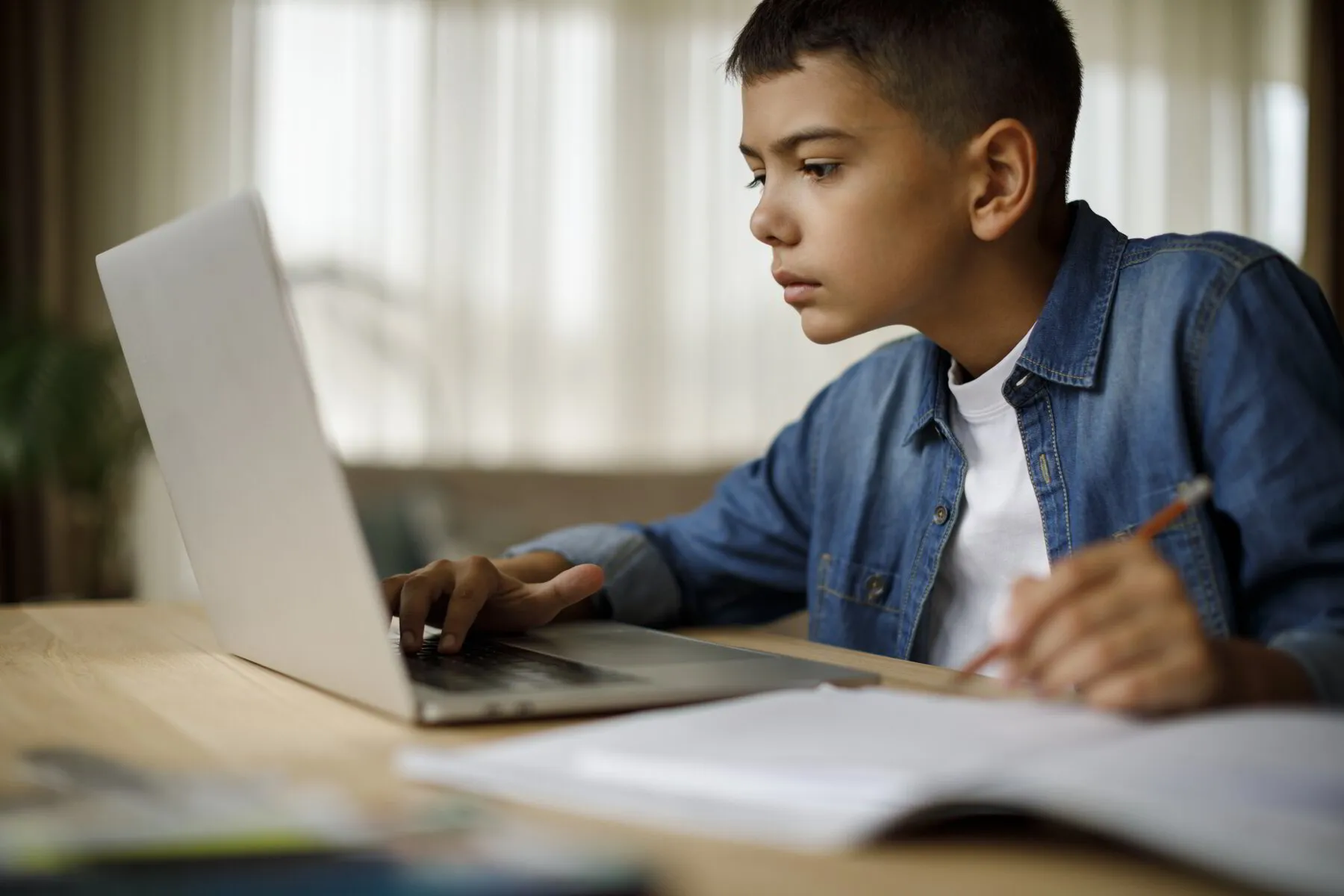 Middle school child on a computer at Discovery Christian School, Effingham IL