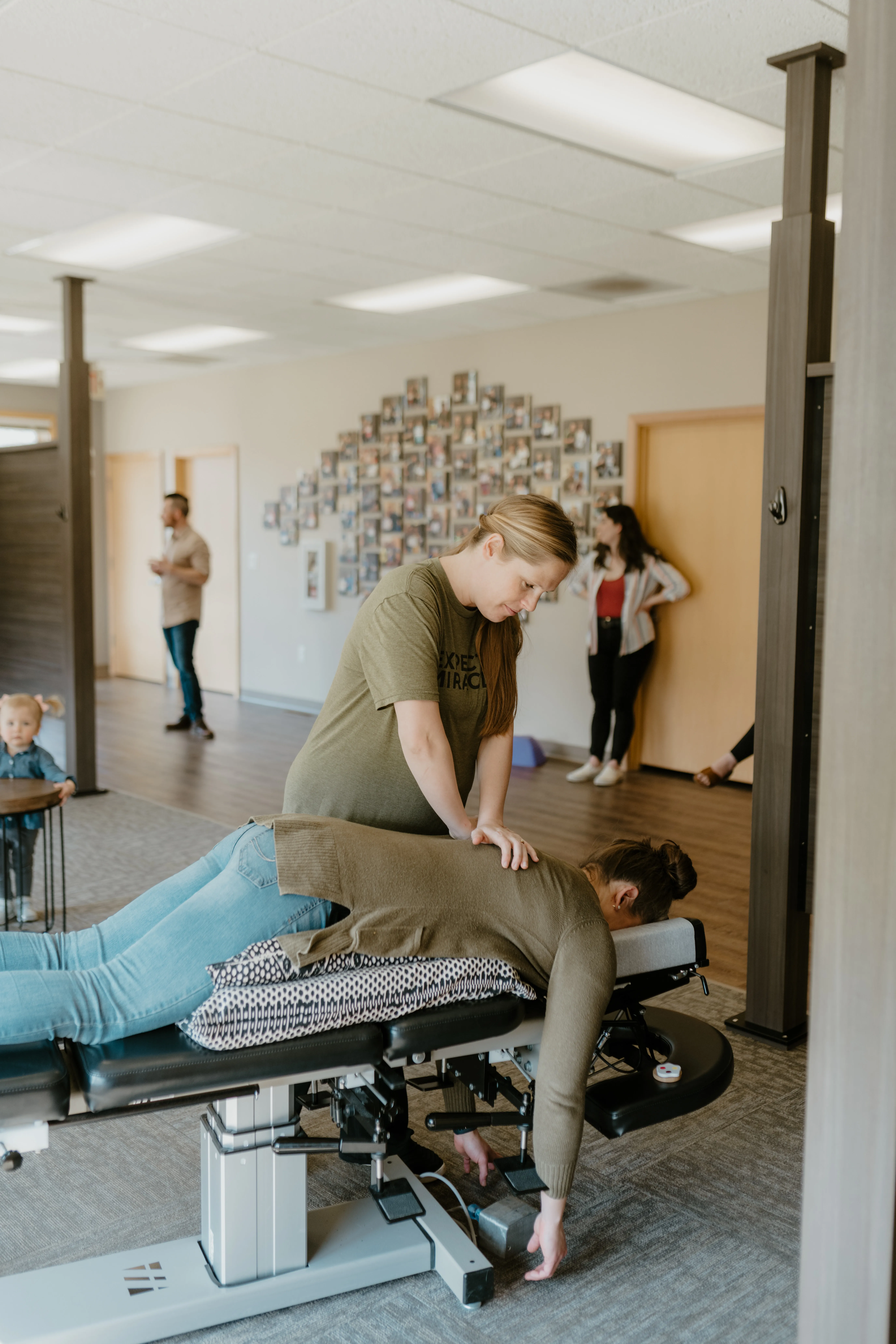 Pregnant patient supported on a chiropractic table