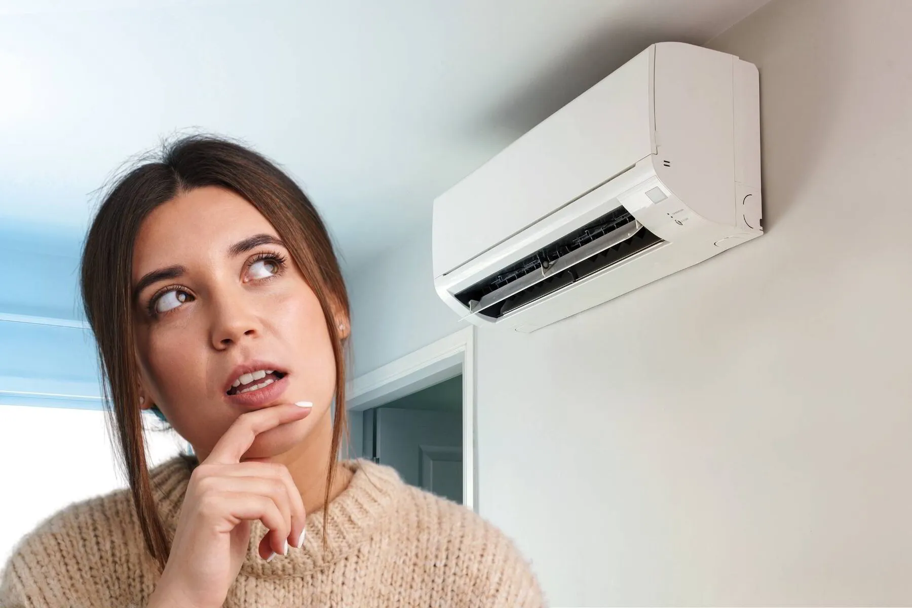 woman thinking about leaking AC