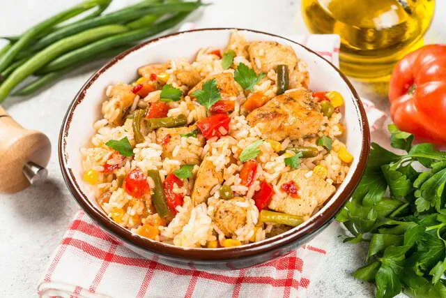Seared chicken and cooked vegetables in Royal Prestige Cookware