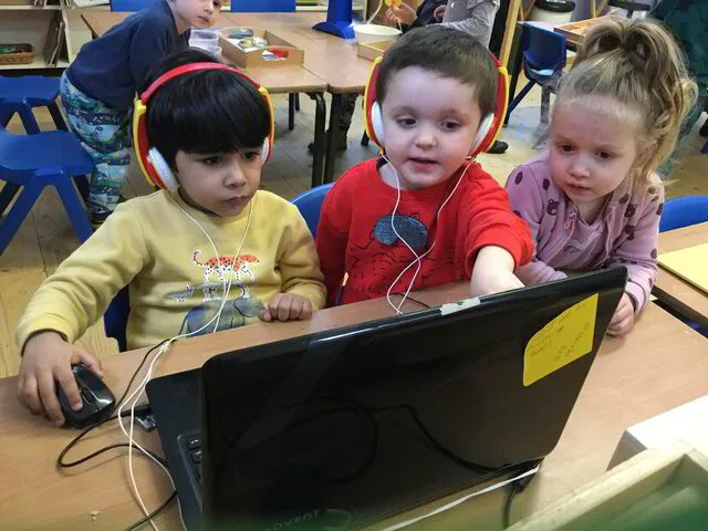 children working at desk