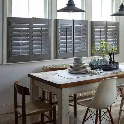 cafe style shutters at window