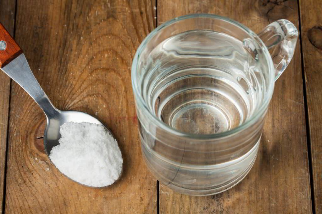 Rinse with warm salt water to keep the tooth clean