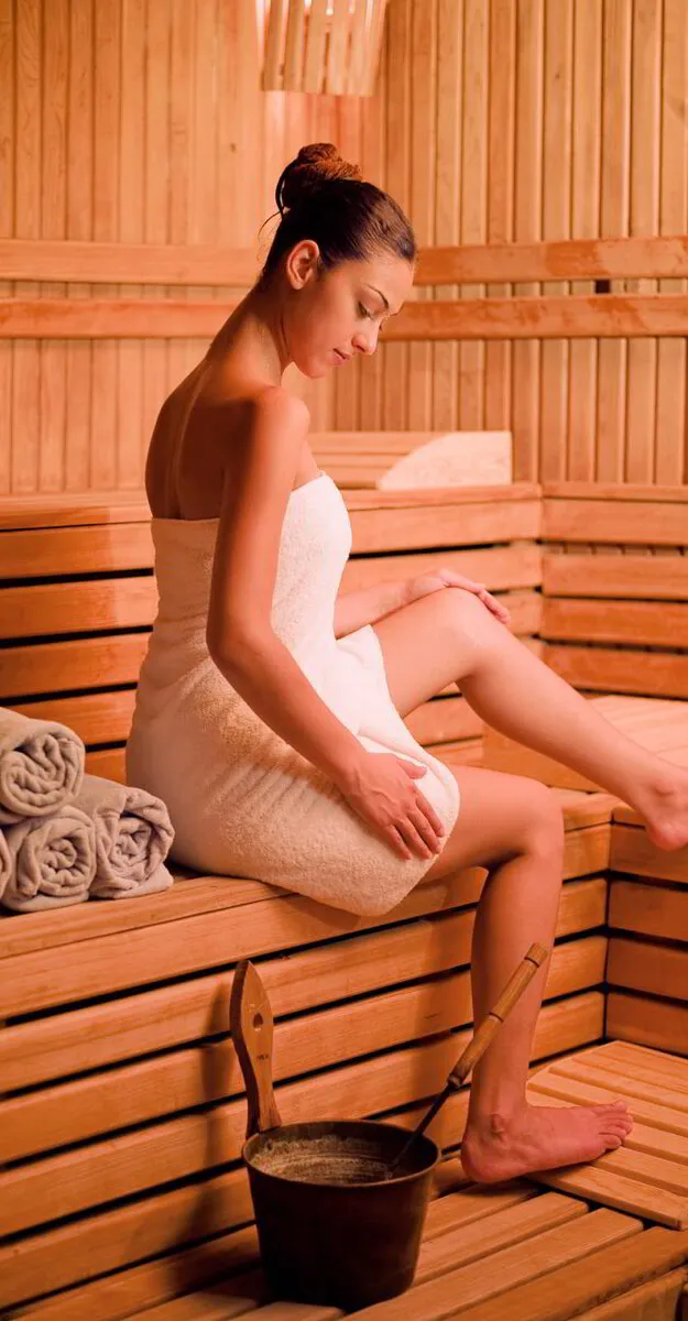 young woman in home sauna