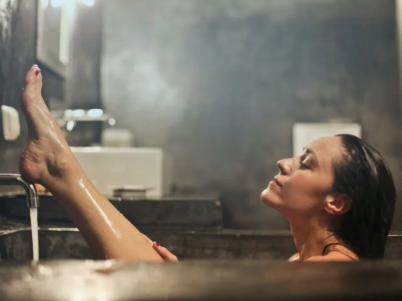 woman enjoying a hot bath