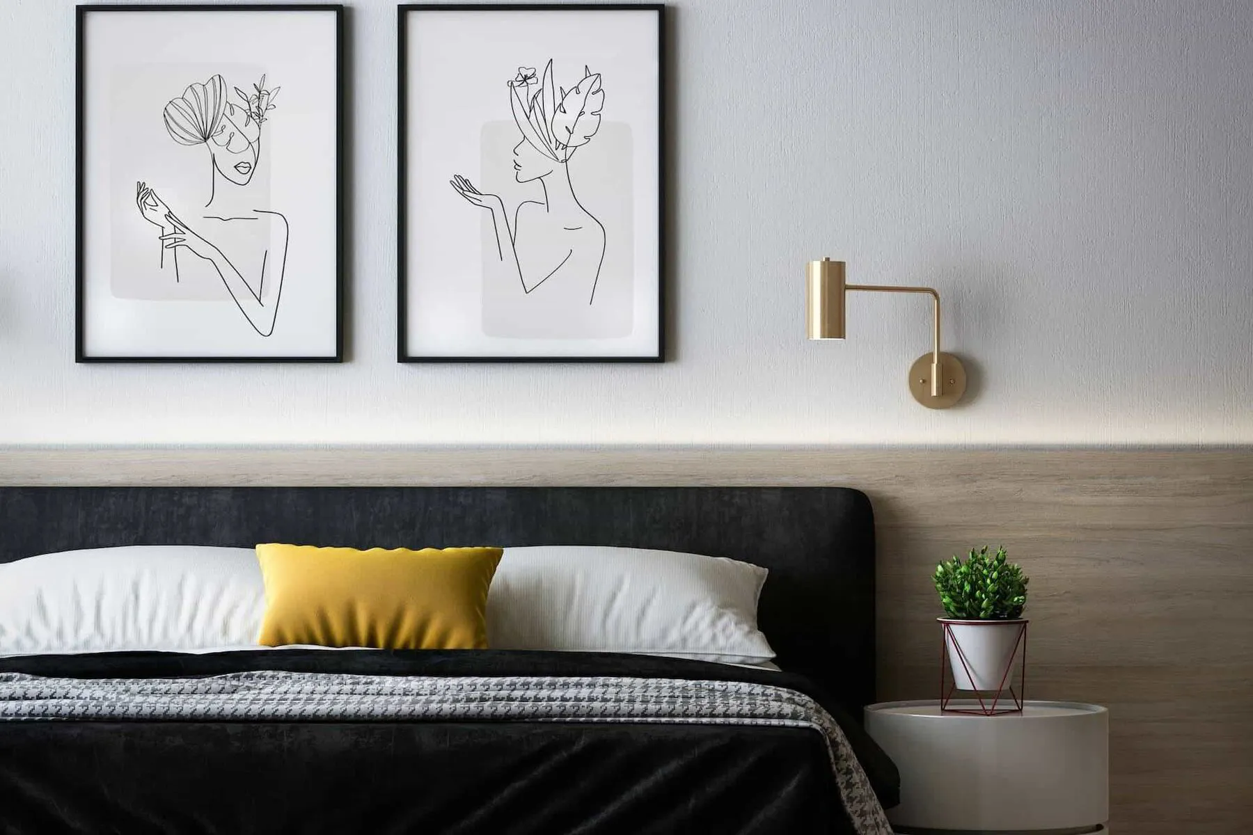 modern bedroom with two artistic drawings on the wall