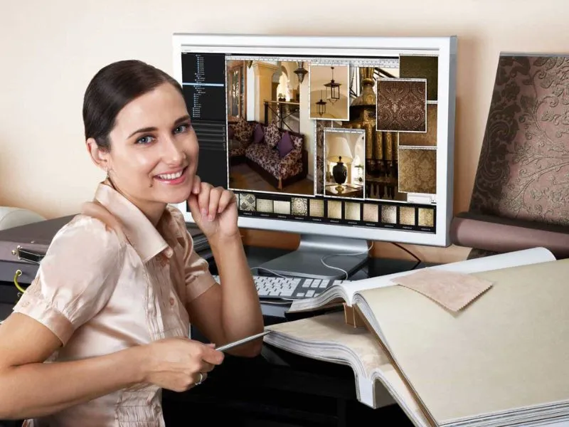 female interior designer smiling working with fabrics