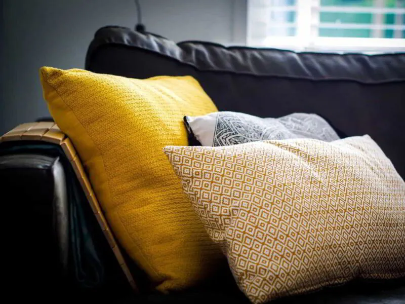 layered pillows in interior design