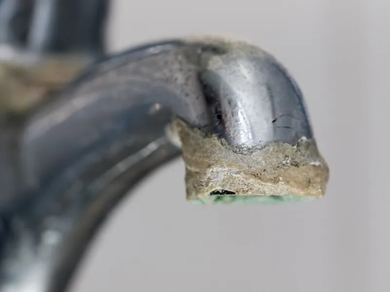 Faucet showing hard water scale