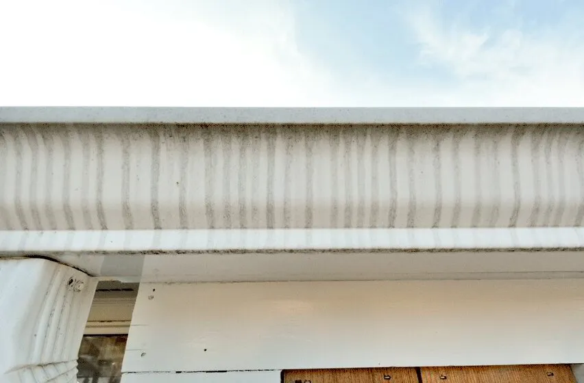 stains on gutters on outside of home