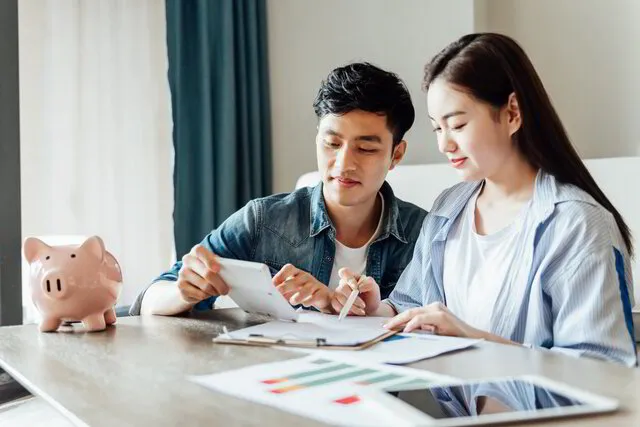 Young couple planning for retirement with Indexed Universal Life