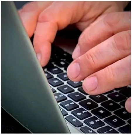 Close-up of a person’s hands typing on a laptop keyboard. The fingers hover over black keys with white letters, suggesting focus and productivity. The lighting is soft, and the image conveys creativity, writing, and digital communication. Meta Keywords: typing on laptop, writing blog post, author at work, digital storytelling, content creation, Soul Sonshine writing ministry, creative process.