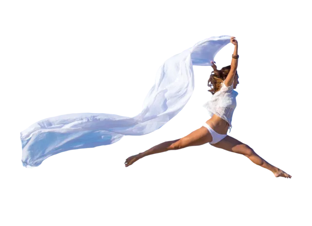 A woman leaping into the air with a long sheet billowing behind her