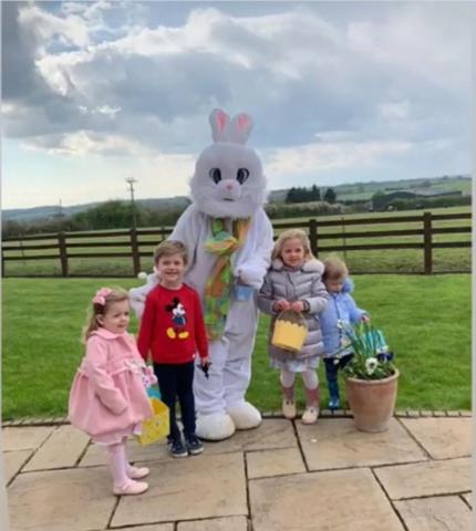 Visiting the Easter Bunny, at Somerset Collection. - a monkey and