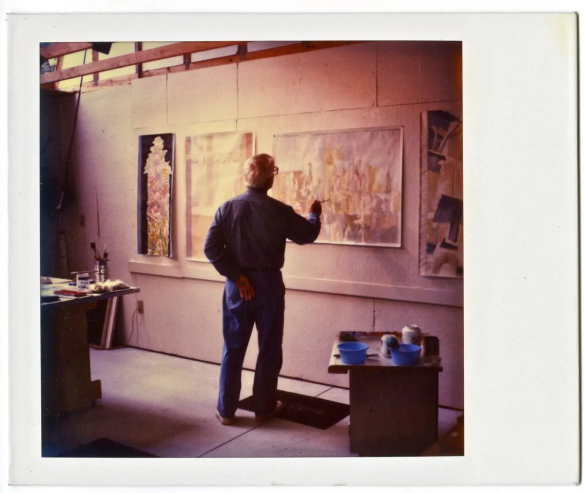 John in his Sheboygan studio, ca. late 1990s. Four works in progress!
