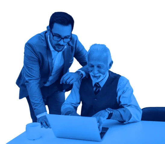 Two men wearing business clothes looking at a laptop screen