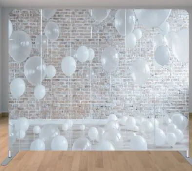 white balloons photo booth backdrop
