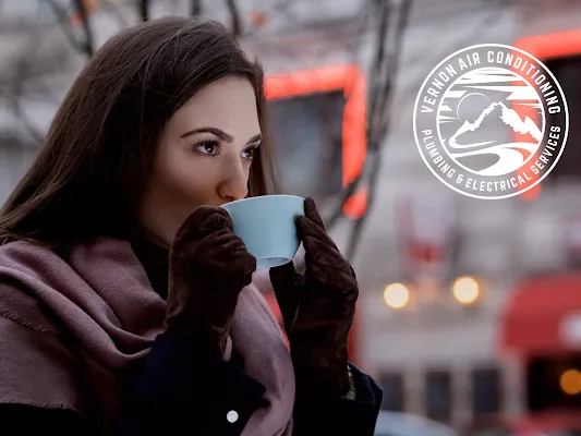 Woman drinking hot coffee
