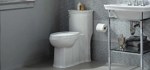 A clogged toilet in a bathroom