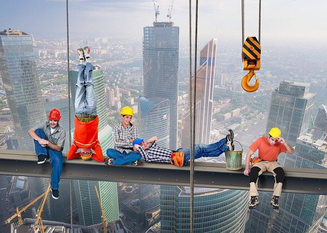 Contractors on a beam