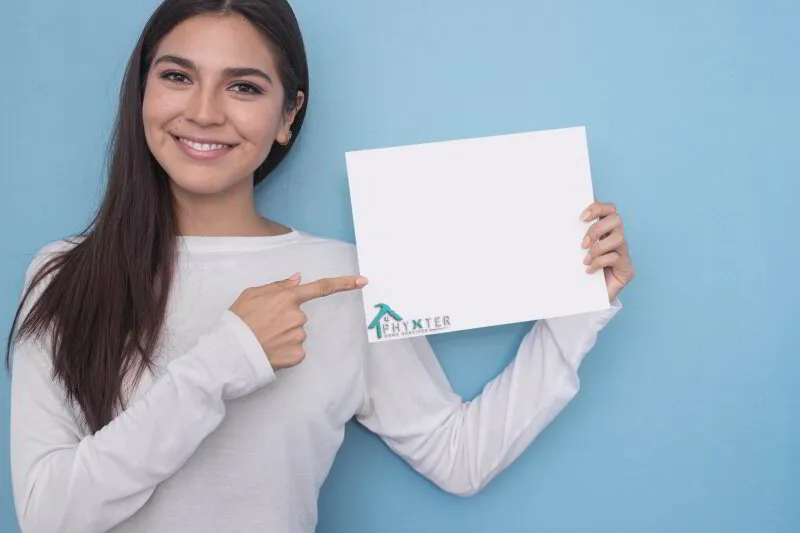 Woman holding Phyxter White Paper