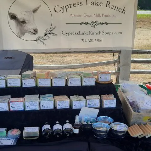 selling goat milk soaps at a market