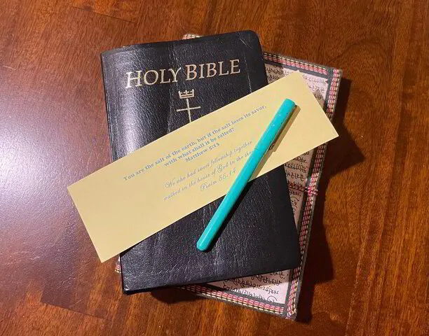 Bible with pen and notepaper