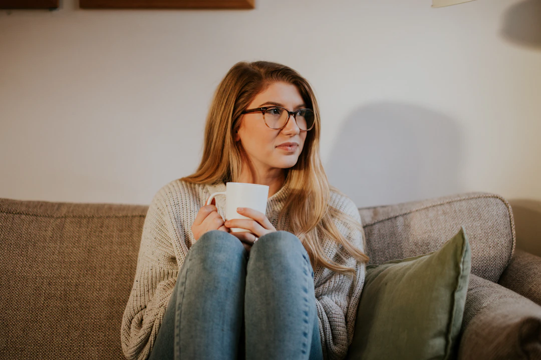 Woman thinking about business ideas at her workspace