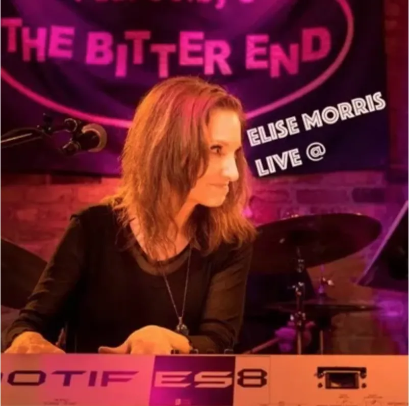 Album cover for 'Live at The Bitter End' featuring Elise Morris, the eclectic jazz musician and singer-songwriter, capturing the energy and essence of her live performance at the legendary NYC venue, The Bitter End.