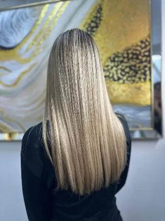 ¿Cuánto tiempo debo esperar para teñirme el cabello después de un alisado permanente?