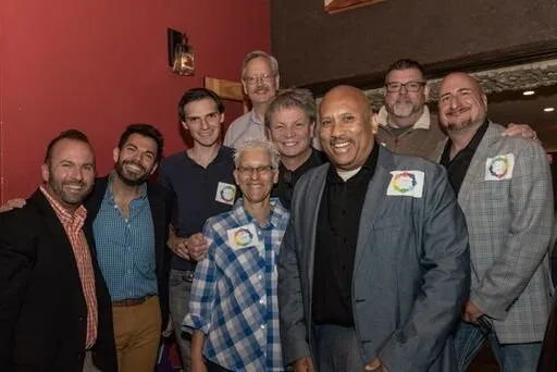 Supporters and activists gather for an ordinance party celebrating the passage of twenty local non-discrimination ordinances in Montgomery County, photographer unknown. Courtesy of the Montgomery County LGBT Business Council.