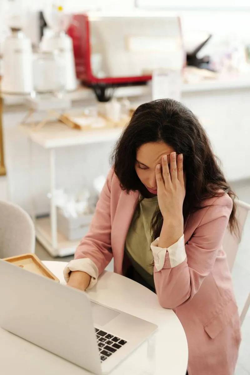 Woman frustrated with her website because she is not using ShinePages - the easiest all in one platform for female entrepreneurs