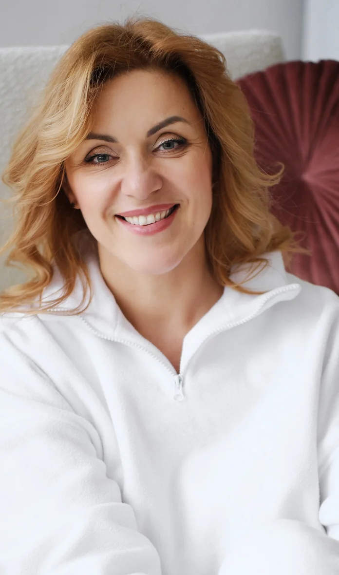 Mature blonde woman smiling