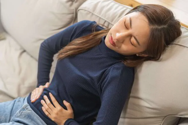 Young girl cramping, abdominal pain