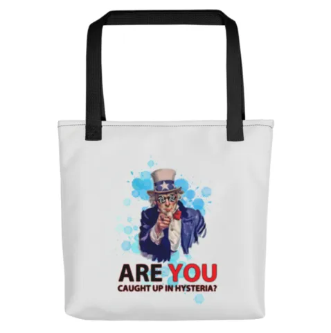 Image showcasing Abby London's merchandise, a tote bag boldly inscribed with the question 'Are you caught up in hysteria?', reflecting the artist's politically charged Conservative anti-pop music message.